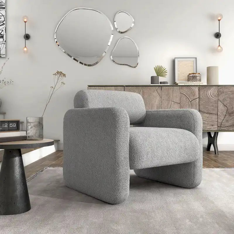 Fauteuil moderne en tissu à dossier arrondi