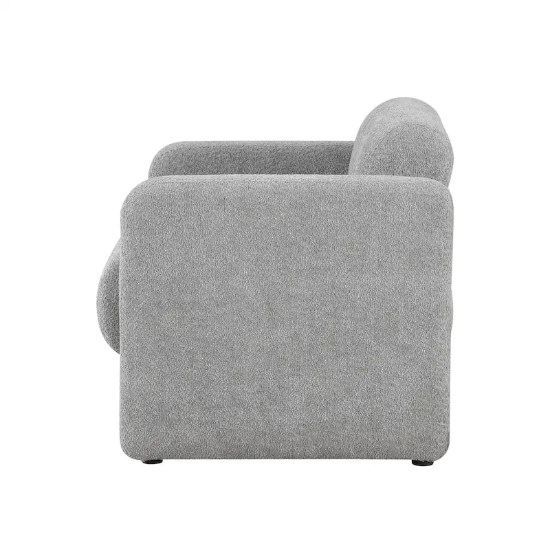 Fauteuil moderne en tissu à dossier arrondi