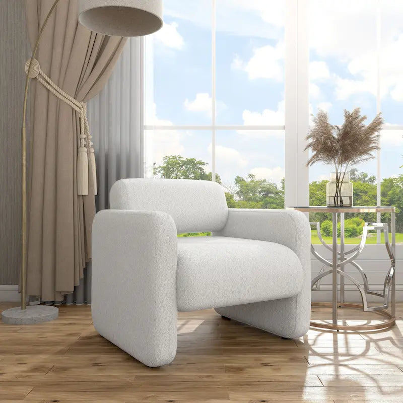 Fauteuil moderne en tissu à dossier arrondi