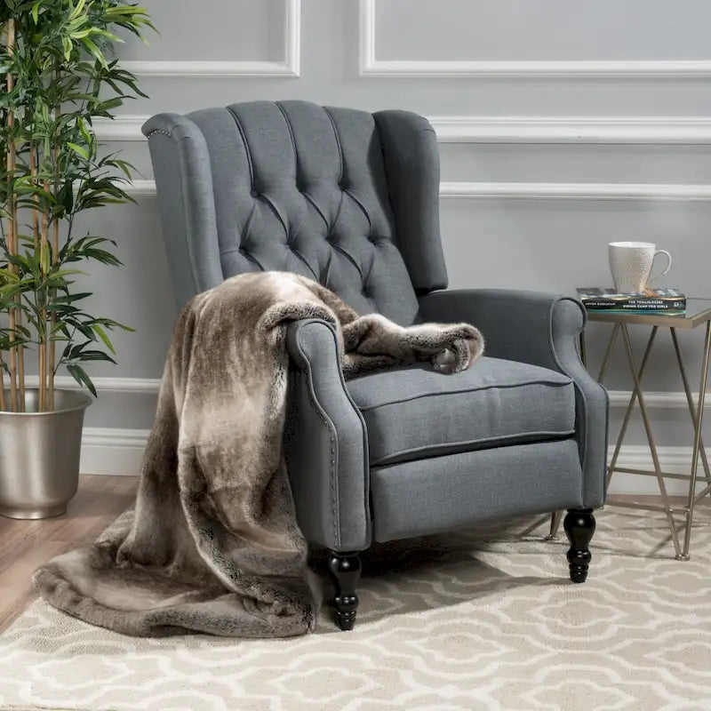 Fauteuil de salon à oreilles en tissu capitonné