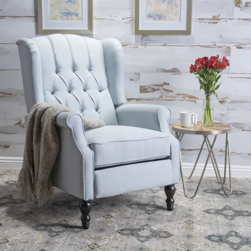 Fauteuil de salon à oreilles en tissu capitonné