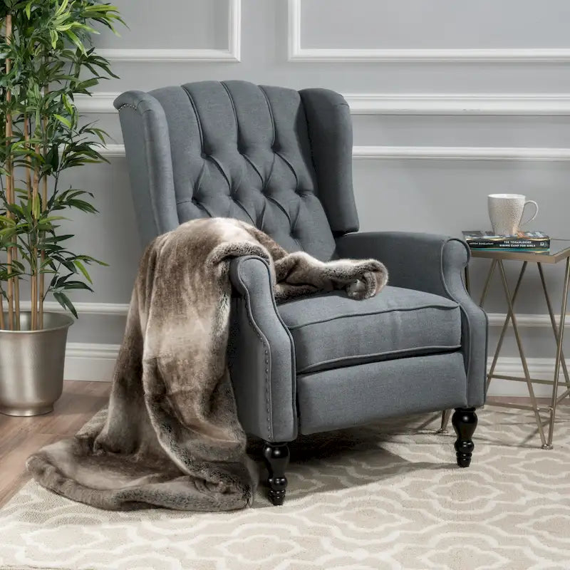 Fauteuil de salon à oreilles en tissu capitonné
