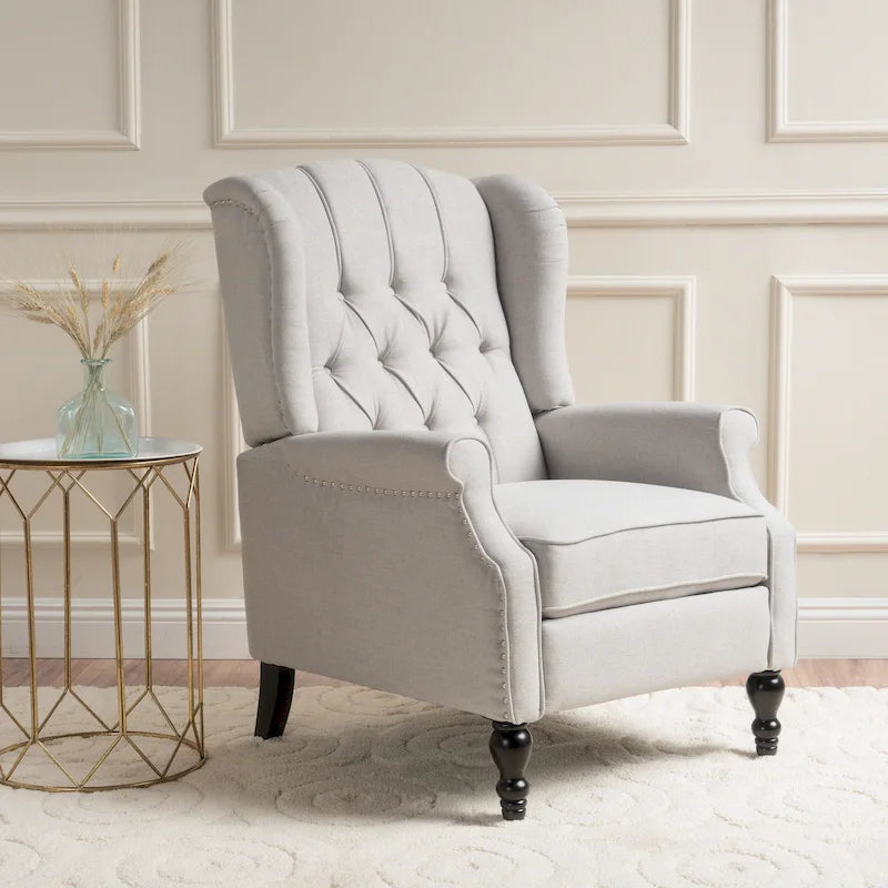 Fauteuil de salon à oreilles en tissu capitonné