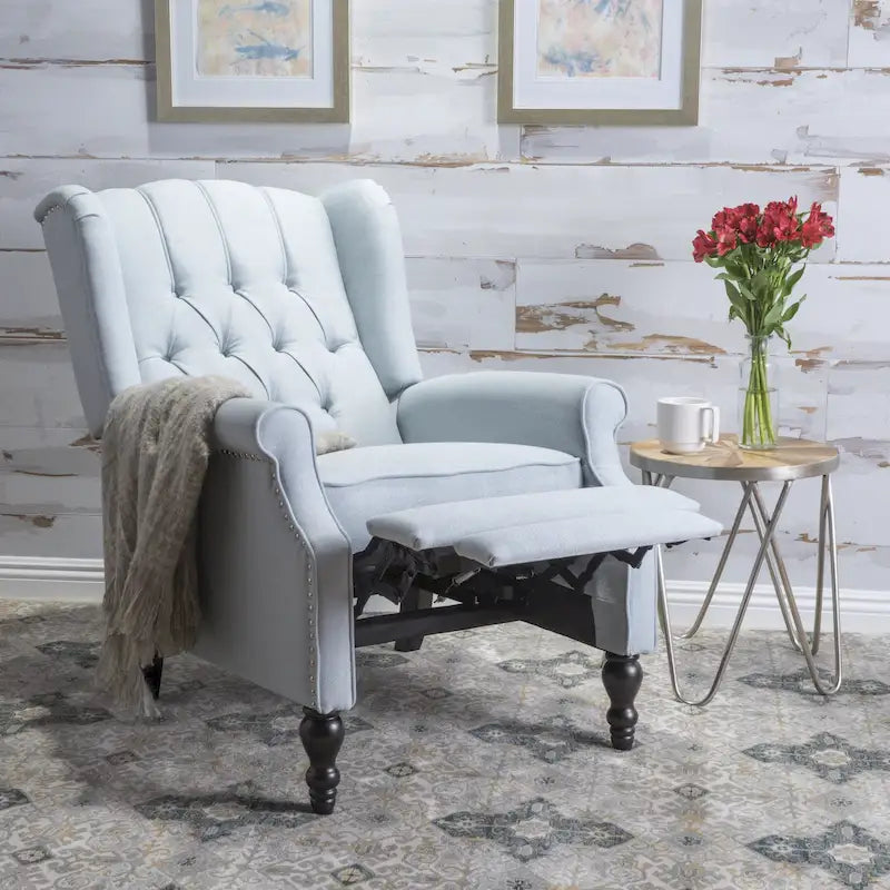Fauteuil de salon à oreilles en tissu capitonné