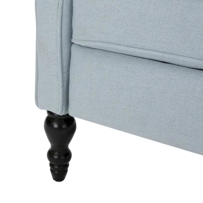 Fauteuil de salon à oreilles en tissu capitonné