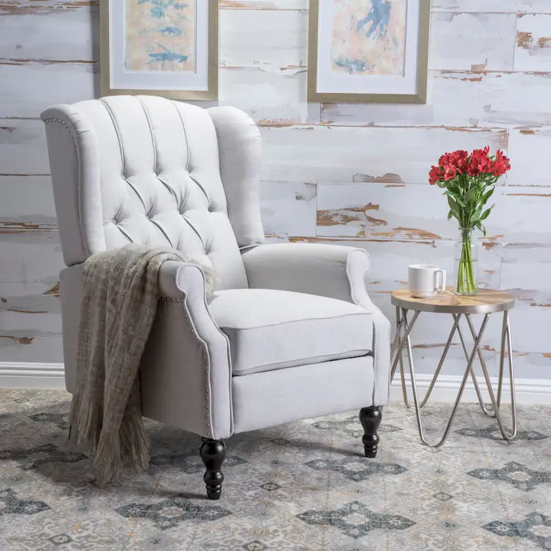 Fauteuil de salon à oreilles en tissu capitonné