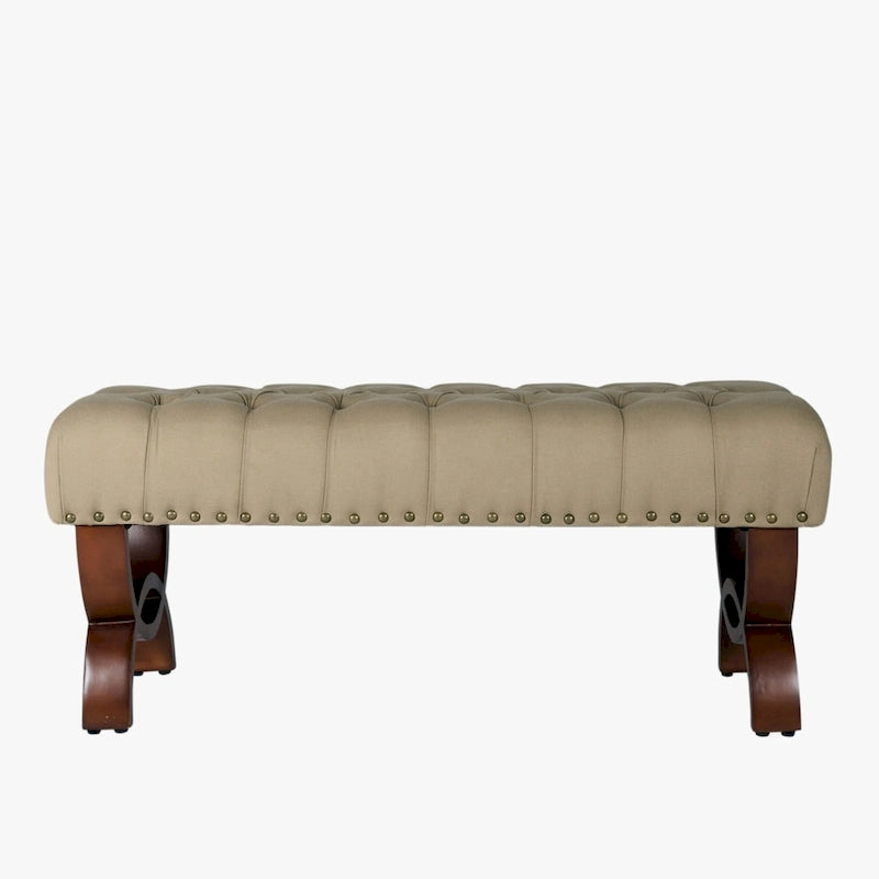 Banc capitonné, orné de rivets
