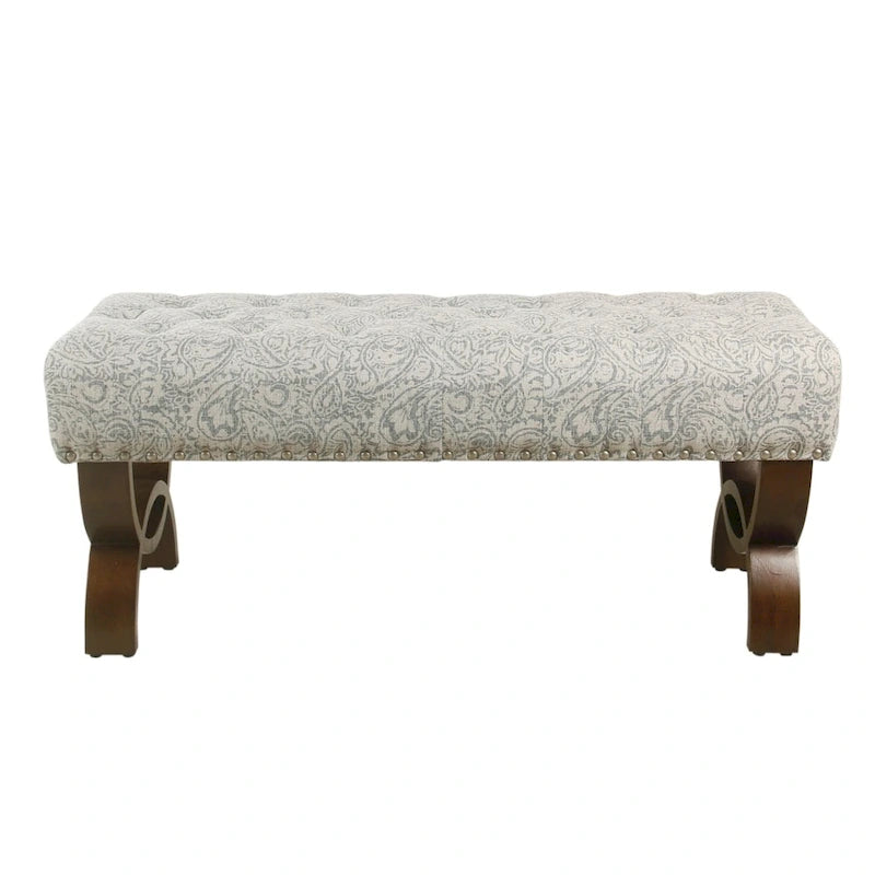 Banc capitonné, orné de rivets