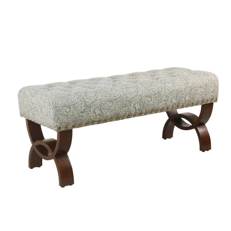 Banc capitonné, orné de rivets