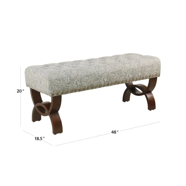 Banc capitonné, orné de rivets