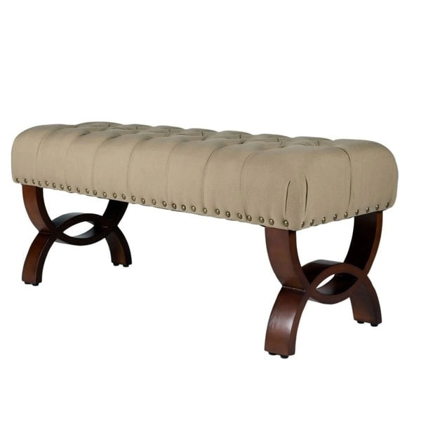 Banc capitonné, orné de rivets